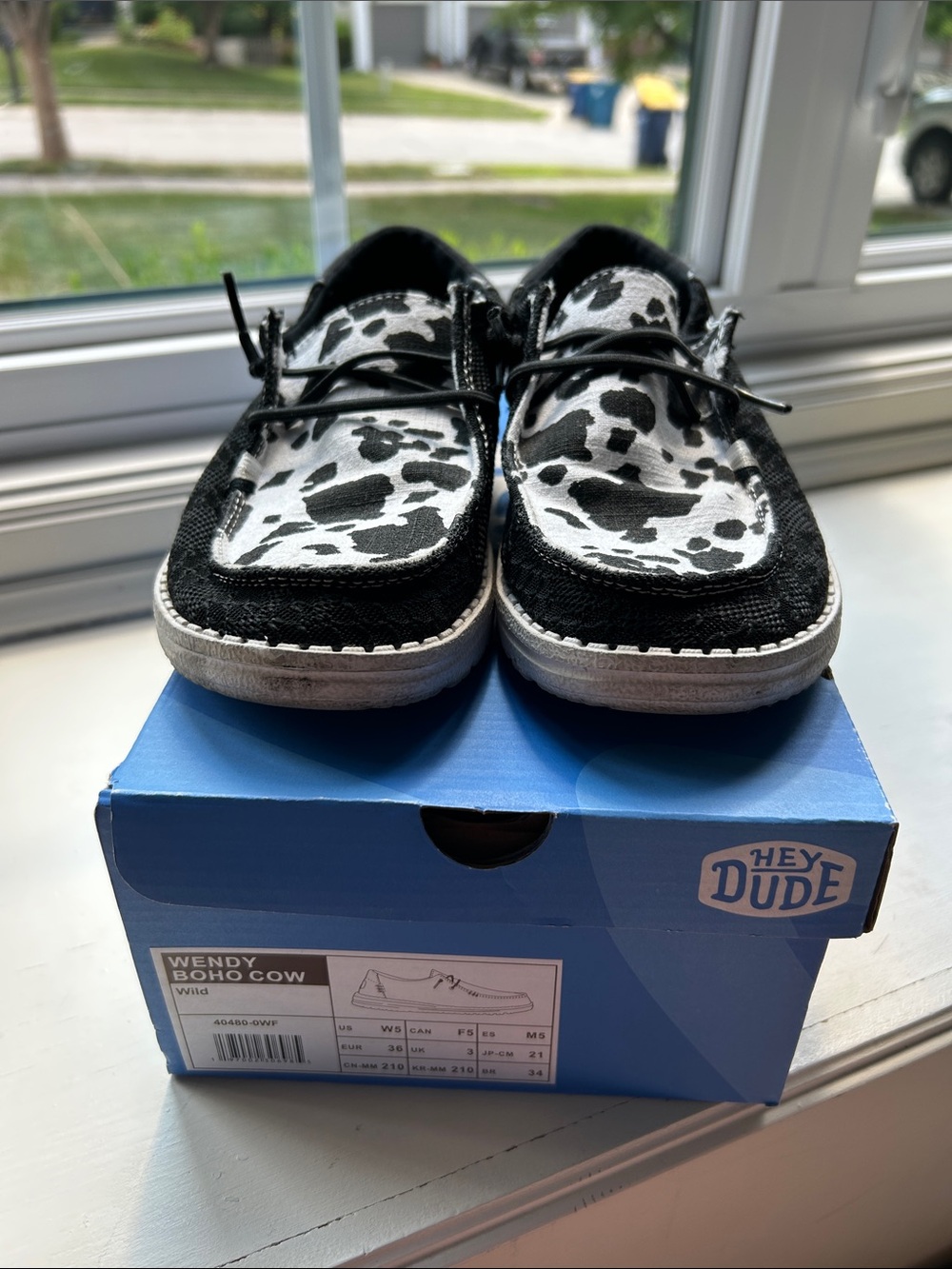 Hey Dude Wendy Boho Cow Women’s Shoes in Black & White Cow Print